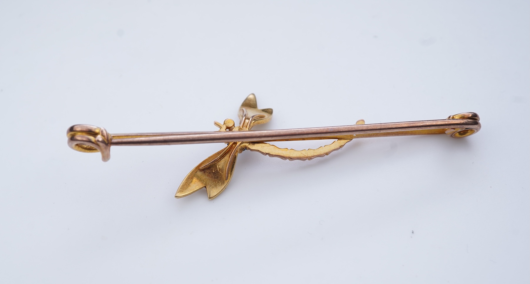 An Edwardian seed pearl and sapphire bar brooch, early 20th century